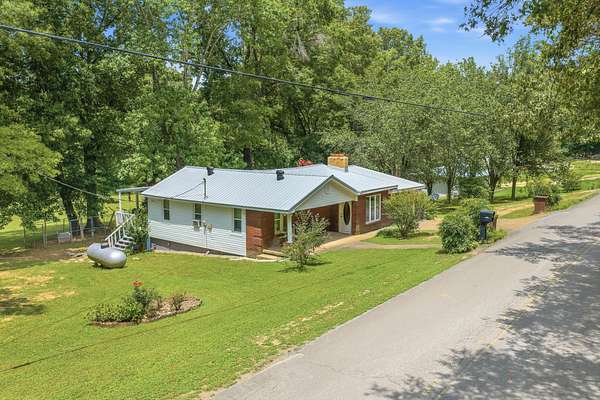 5.45 Acres of Land with Home for Sale in Decaturville, Tennessee