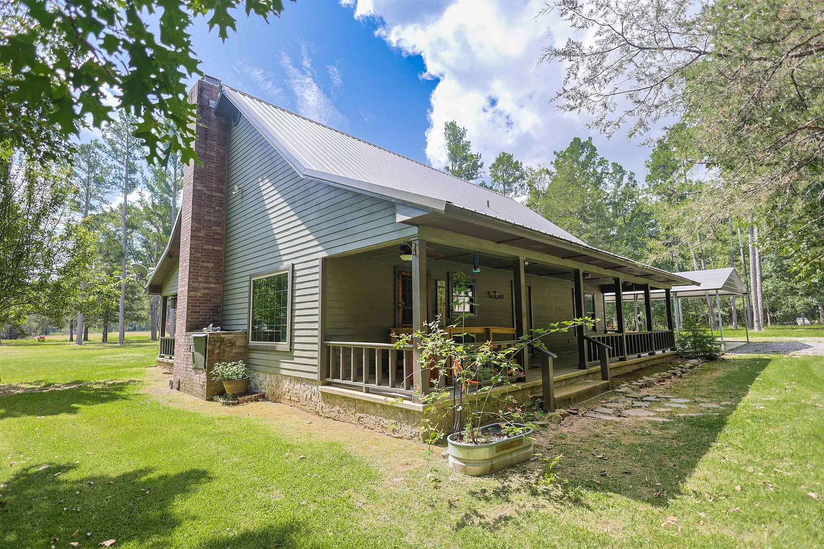 5.78 Acres of Land with Home for Sale in Story, Arkansas