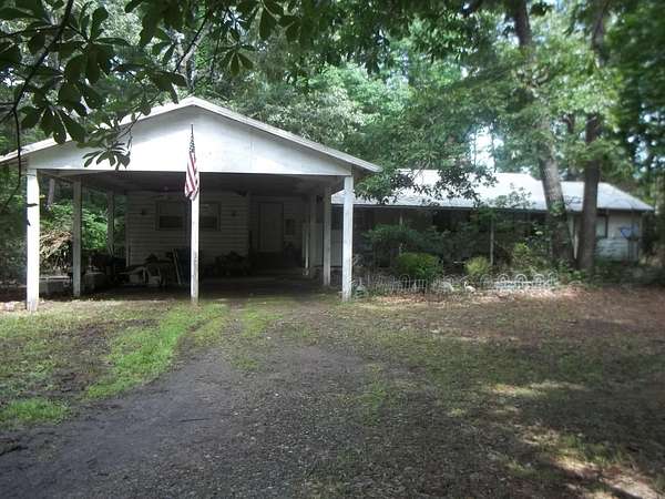 11.4 Acres of Land with Home for Sale in Mena, Arkansas