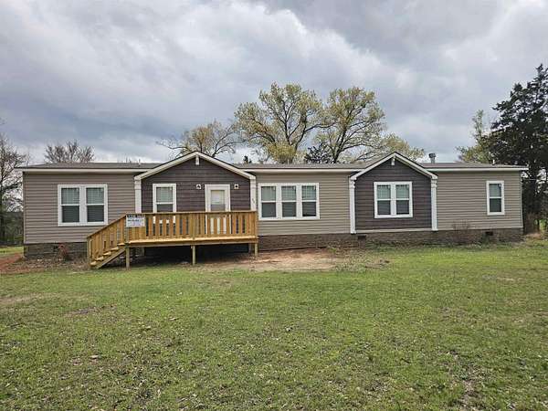 1.83 Acres of Land with Home for Sale in Daingerfield, Texas