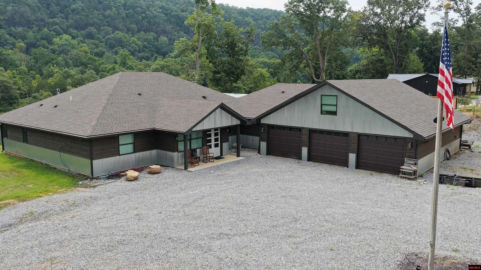 1.56 Acres of Land with Home for Sale in Flippin, Arkansas