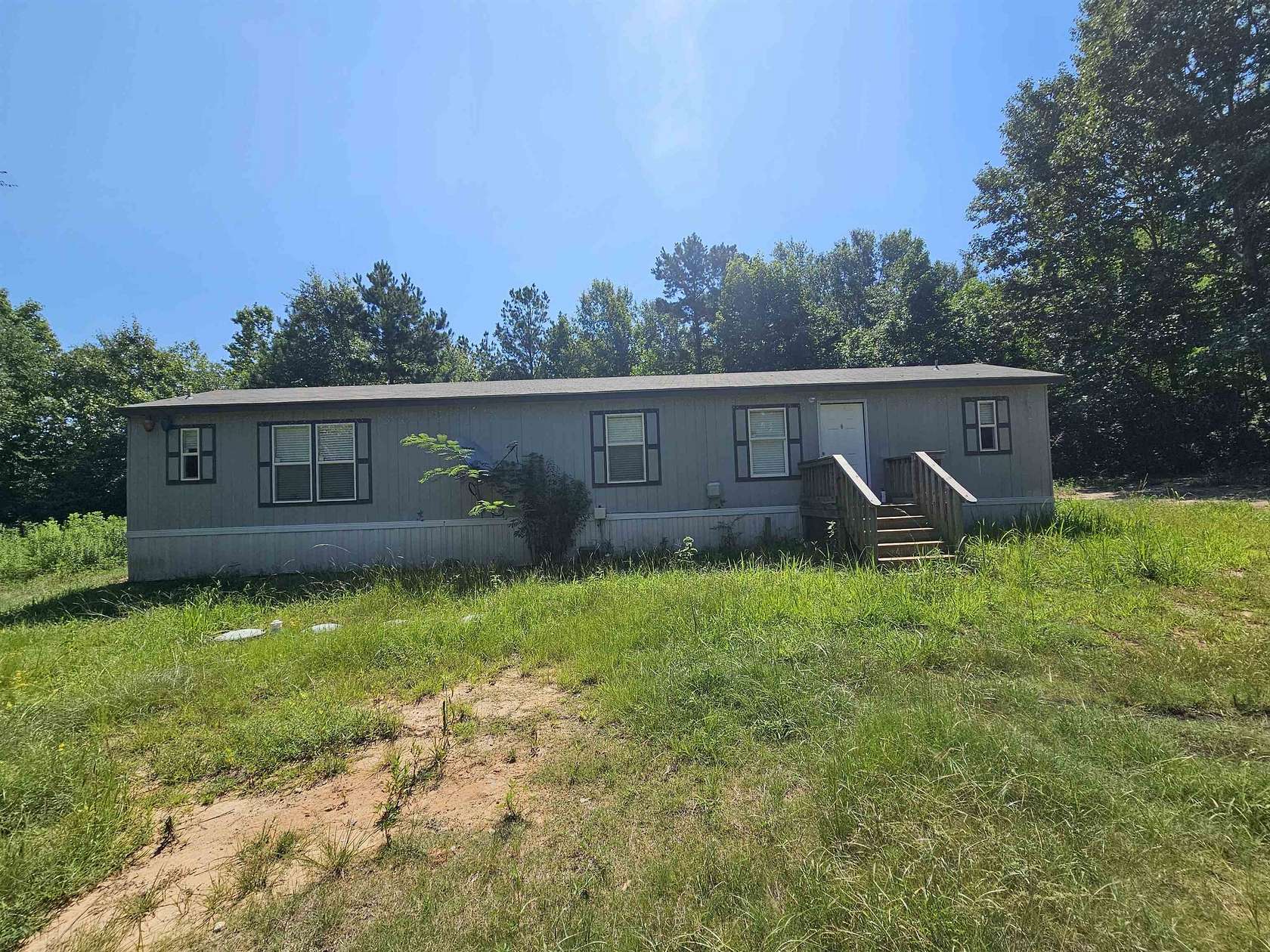 2 Acres of Land with Home for Sale in Overton, Texas