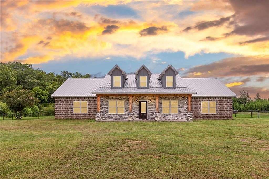 7.6 Acres of Land with Home for Sale in Cowarts, Alabama