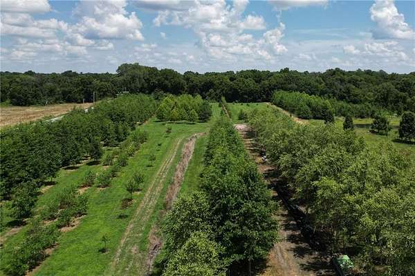 9.9 Acres of Land with Home for Sale in Harrisonville, Missouri