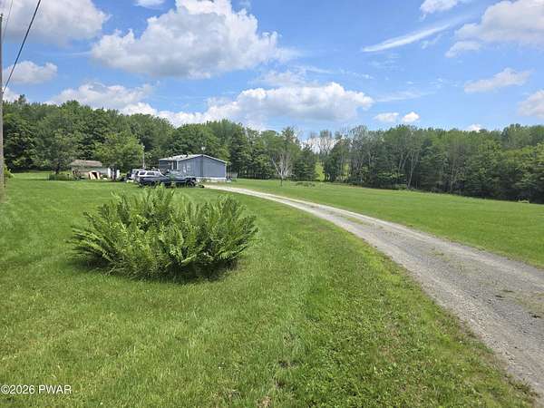 4 Acres of Land with Home for Sale in Pleasant Mount, Pennsylvania