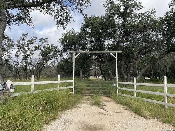 10.5 Acres of Land with Home for Sale in Devine, Texas
