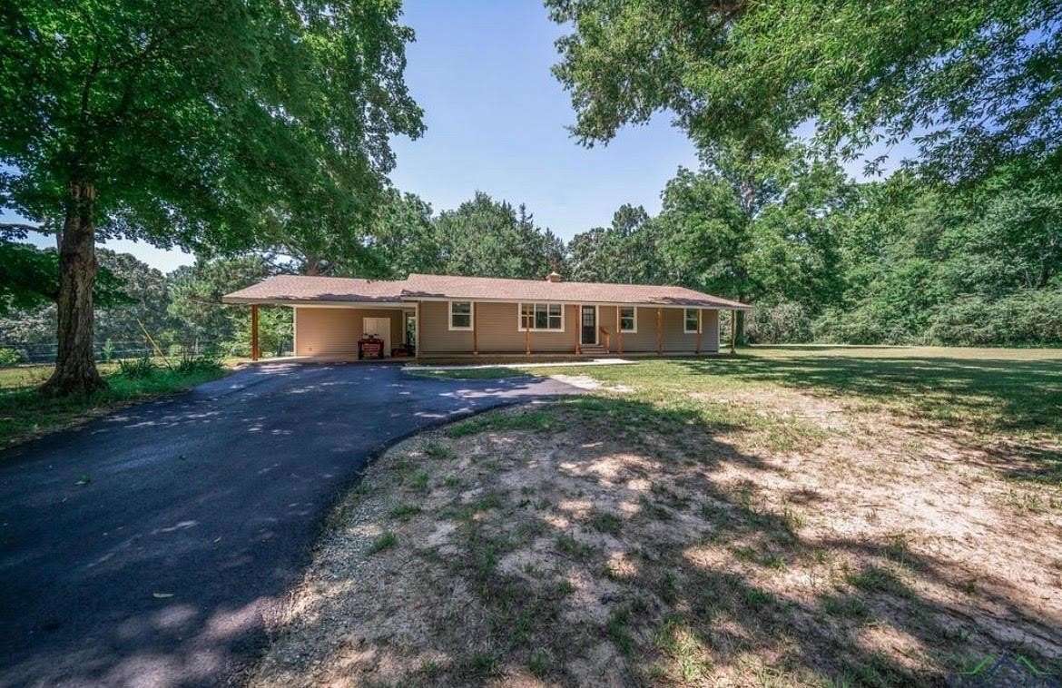 6.3 Acres of Land with Home for Sale in Hallsville, Texas
