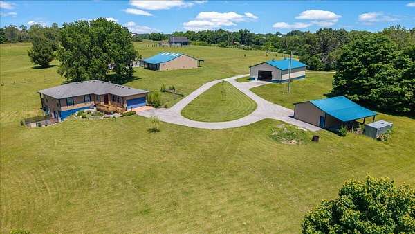 15 Acres of Land with Home for Sale in Stamping Ground, Kentucky