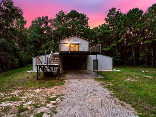 2.12 Acres of Land with Home for Sale in Kiln, Mississippi
