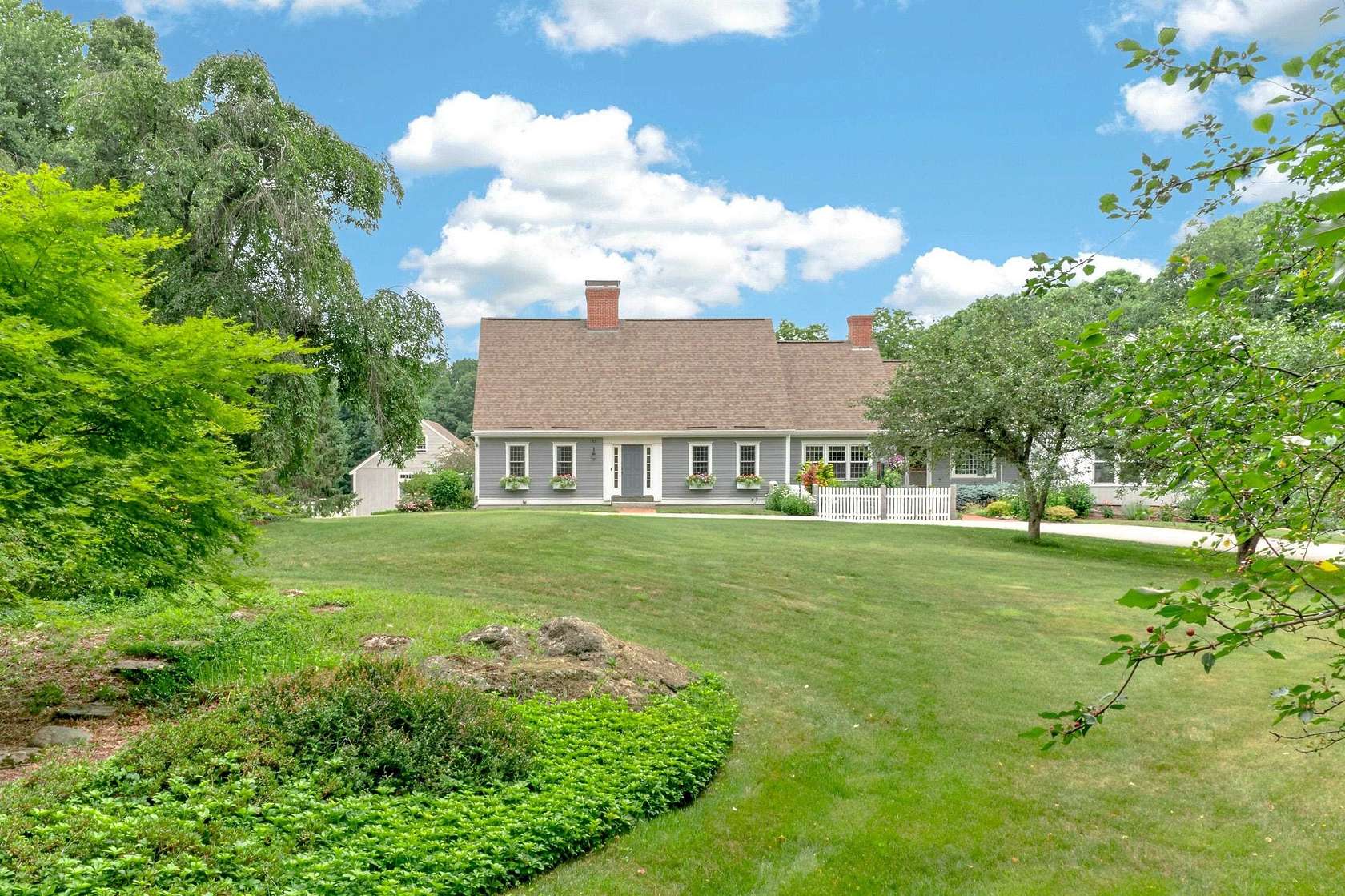 7.8 Acres of Land with Home for Sale in New Boston, New Hampshire