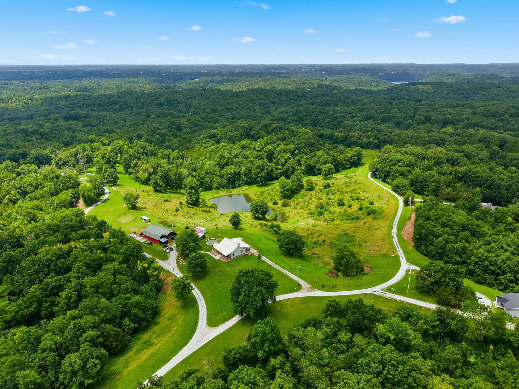 16 Acres of Recreational Land with Home for Sale in Lawrenceburg, Kentucky
