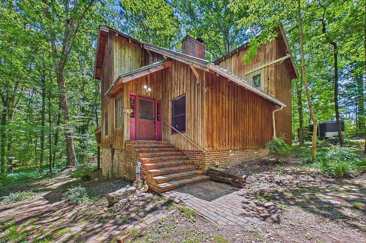 5.29 Acres of Land with Home for Sale in Riceville, Tennessee