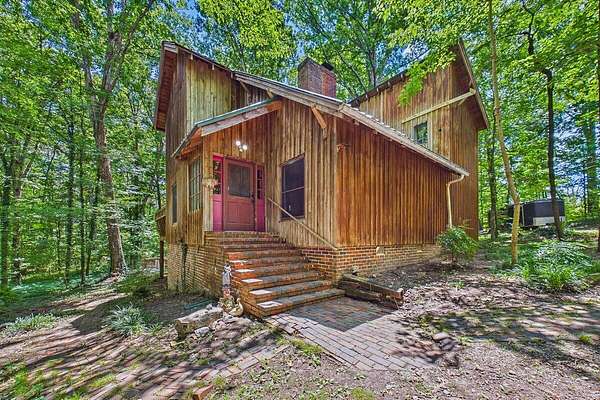 5.29 Acres of Land with Home for Sale in Riceville, Tennessee