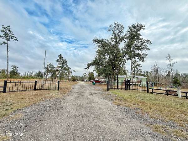 10.6 Acres of Improved Land for Sale in Marianna, Florida