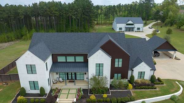 12.1 Acres of Land with Home for Sale in Marshall, Texas