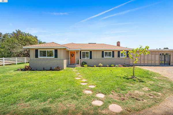 3.23 Acres of Land with Home for Sale in Hughson, California