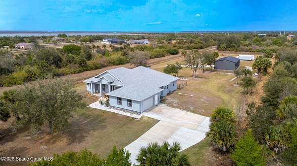 2.75 Acres of Land with Home for Sale in Palm Bay, Florida