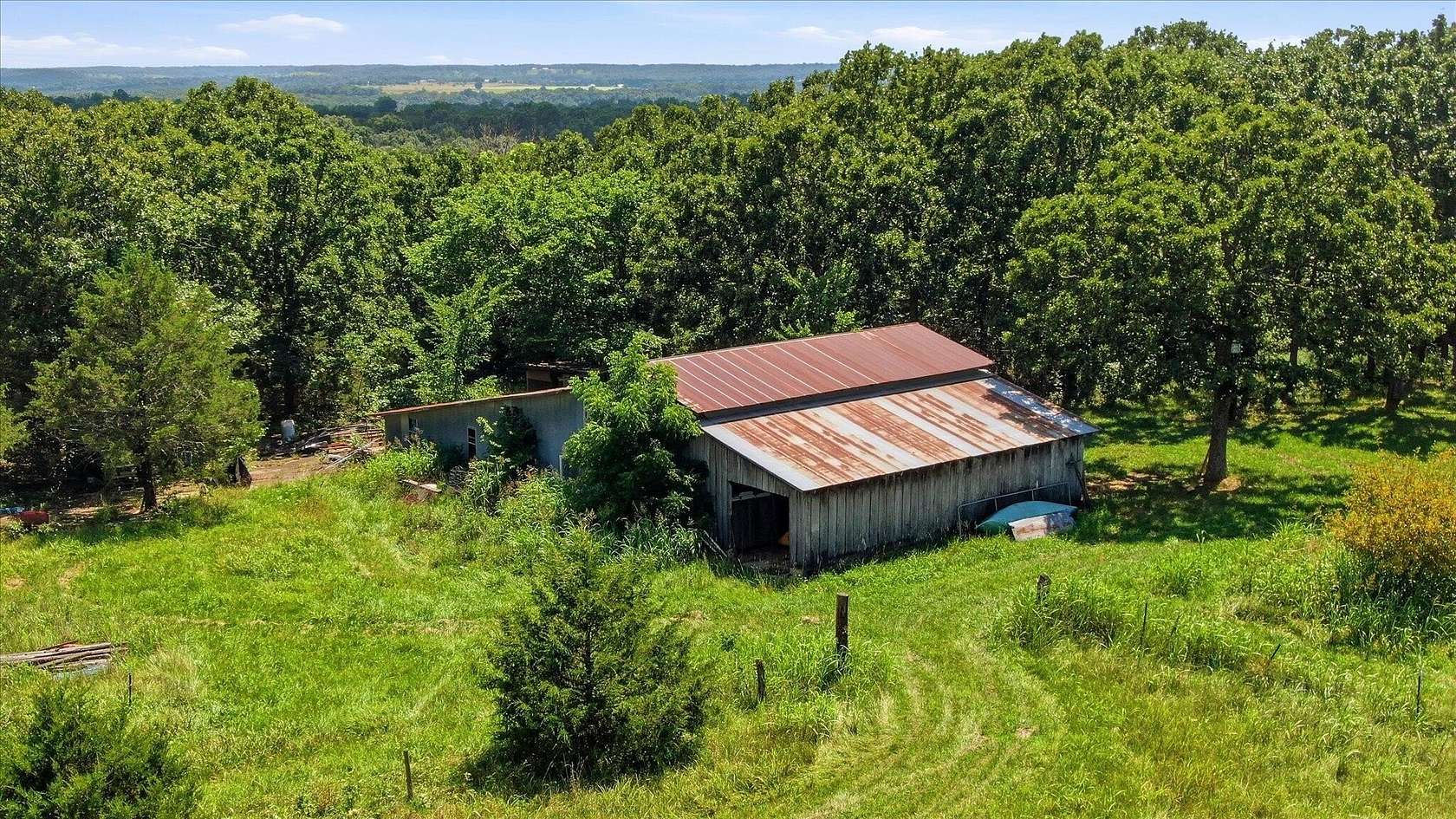 39.7 Acres of Land with Home for Sale in Fair Grove, Missouri