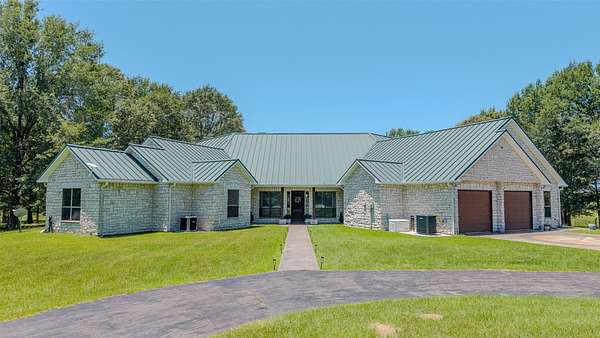 14.6 Acres of Land with Home for Sale in Linden, Texas
