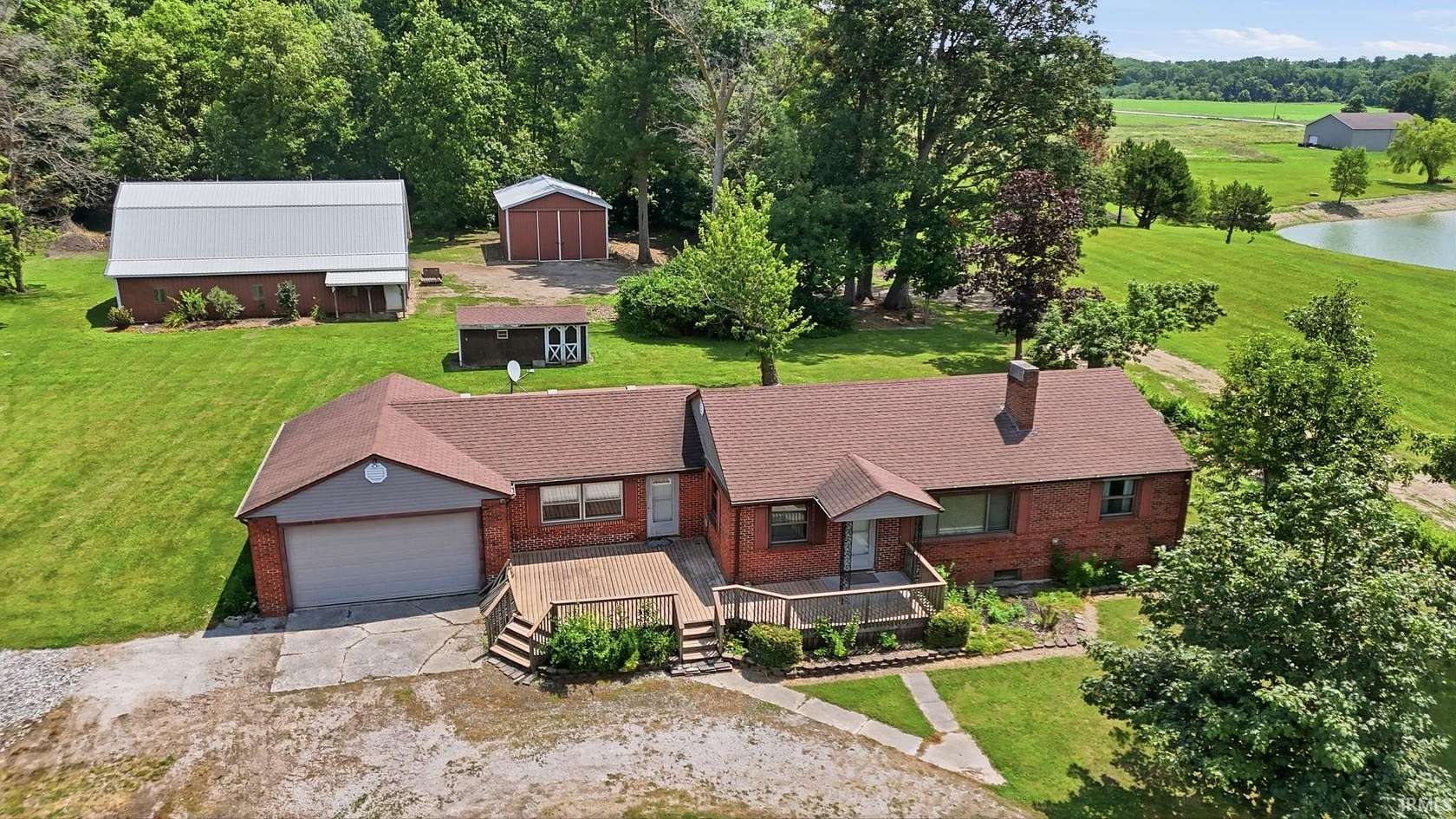 11 Acres of Land with Home for Auction in Ossian, Indiana