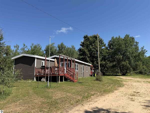 5 Acres of Land with Home for Sale in Copemish, Michigan