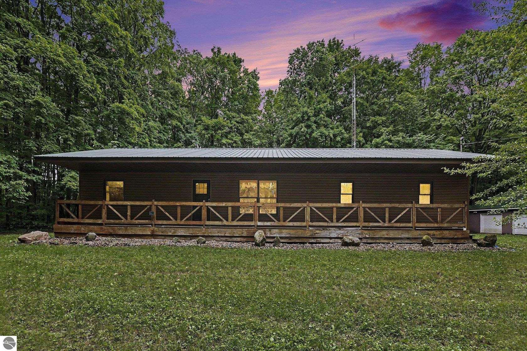 10.5 Acres of Recreational Land with Home for Sale in Lake City, Michigan