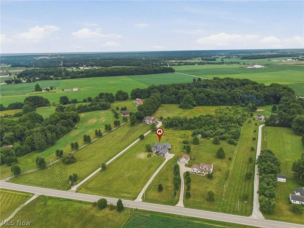 5 Acres of Land with Home for Sale in Louisville, Ohio
