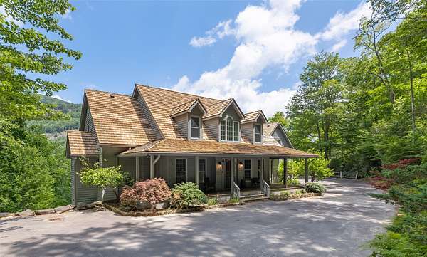 1.76 Acres of Land with Home for Sale in Cashiers, North Carolina