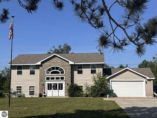 2.2 Acres of Land with Home for Sale in Mancelona, Michigan