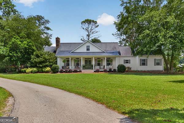 4.58 Acres of Land with Home for Sale in Roopville, Georgia