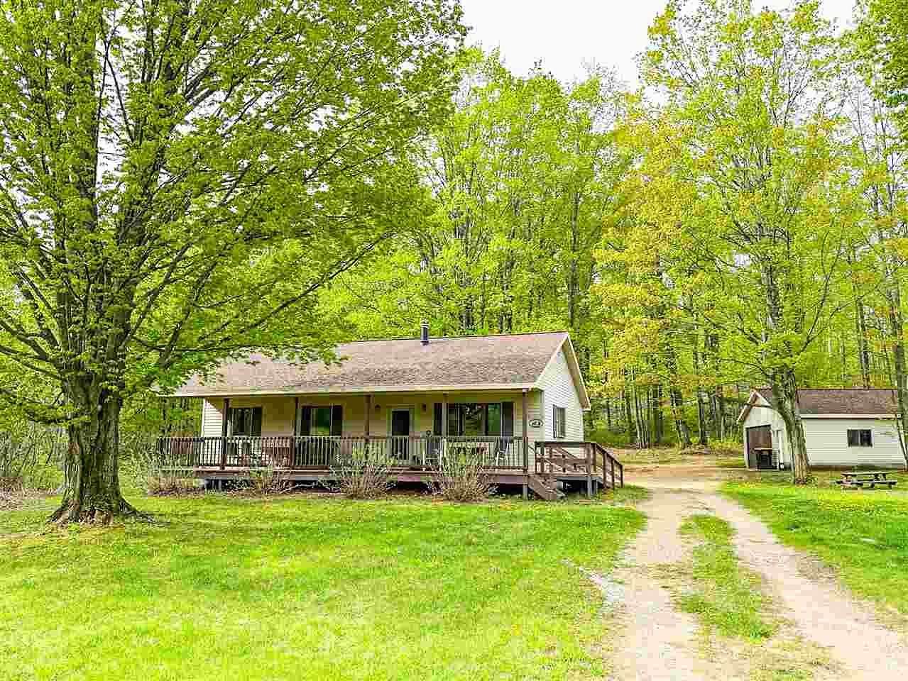 10 Acres of Land with Home for Sale in East Jordan, Michigan