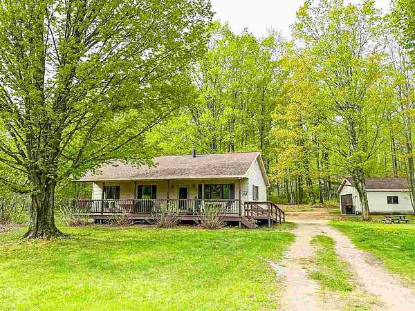 10 Acres of Land with Home for Sale in East Jordan, Michigan