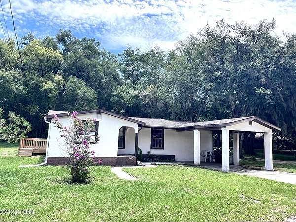 1.84 Acres of Land with Home for Sale in Oak Hill, Florida