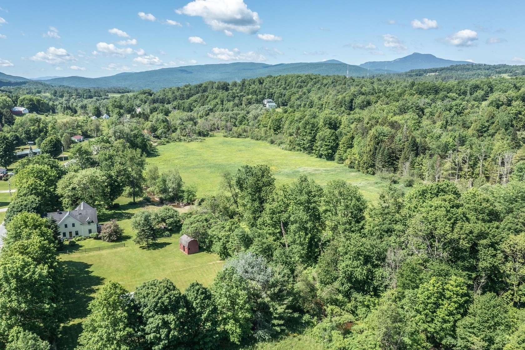 13 Acres of Land with Home for Sale in Waterbury, Vermont