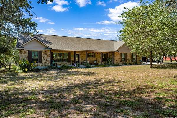 5 Acres of Land with Home for Sale in Floresville, Texas