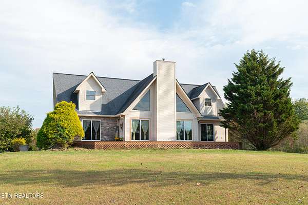 16.9 Acres of Land with Home for Sale in Oneida, Tennessee