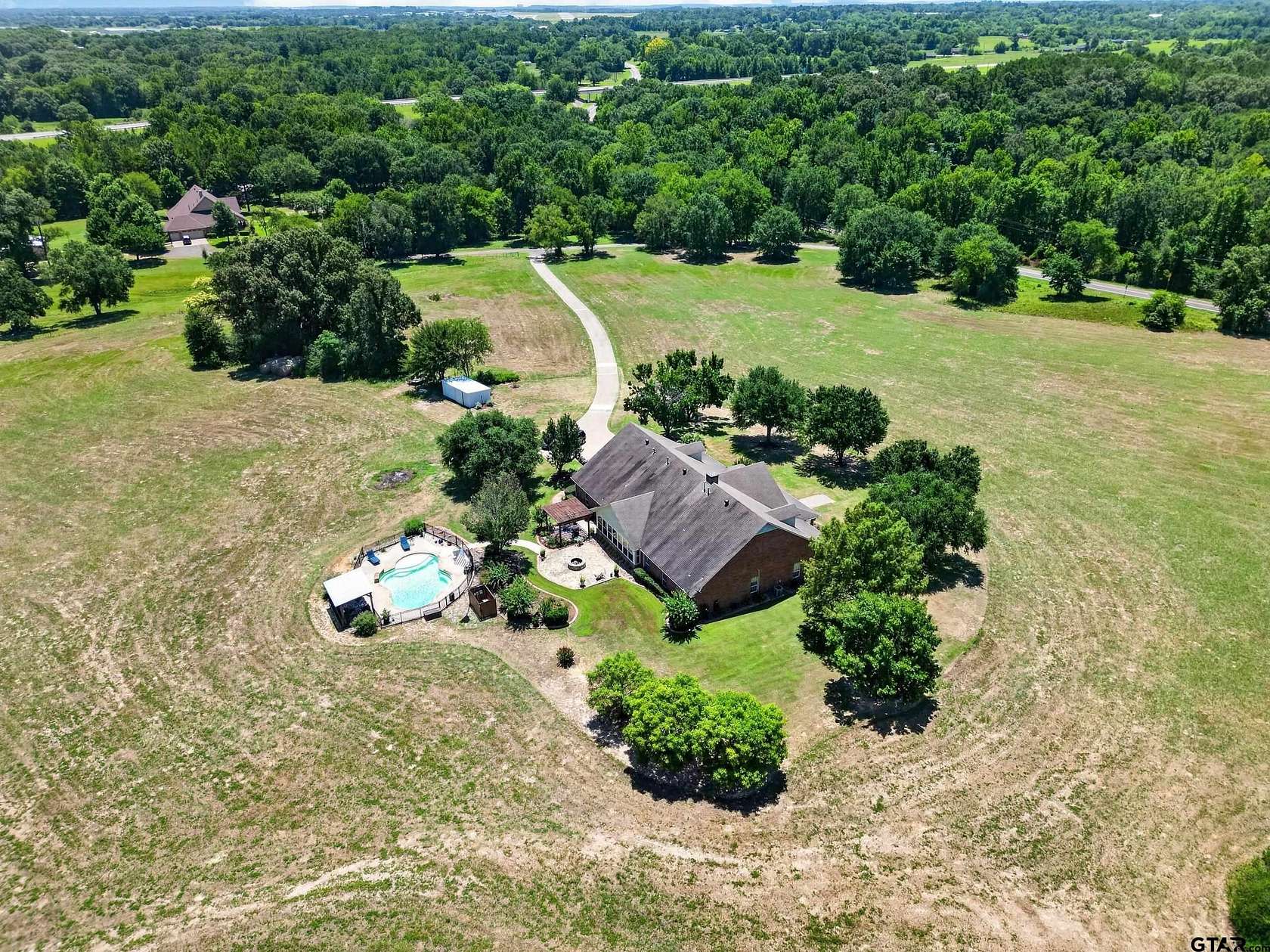 13.9 Acres of Land with Home for Sale in Tyler, Texas