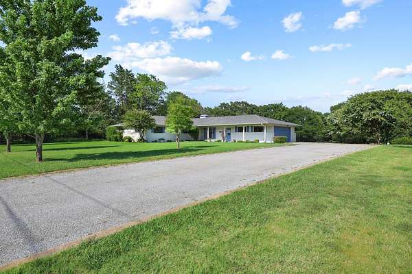 3.3 Acres of Land with Home for Sale in Denison, Texas
