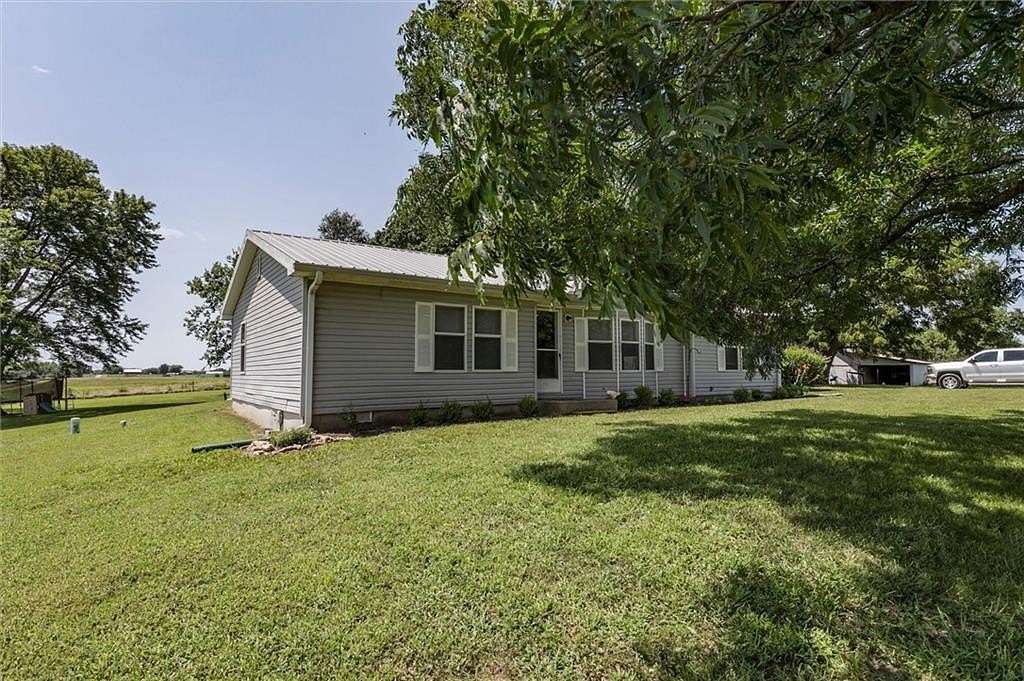 5 Acres of Land with Home for Sale in Amoret, Missouri