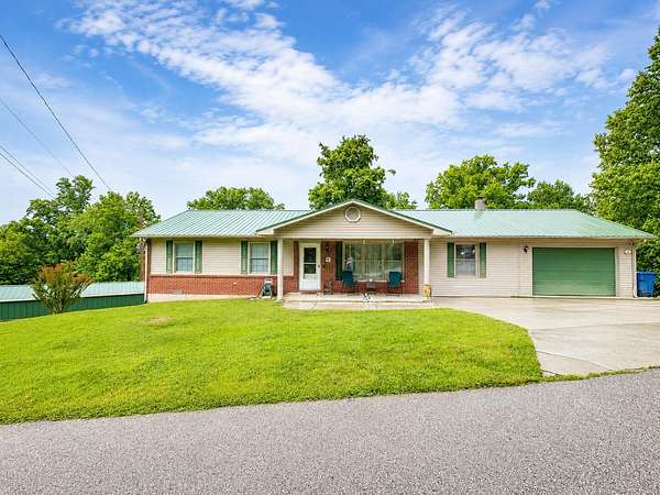 1.63 Acres of Land with Home for Sale in Stearns, Kentucky