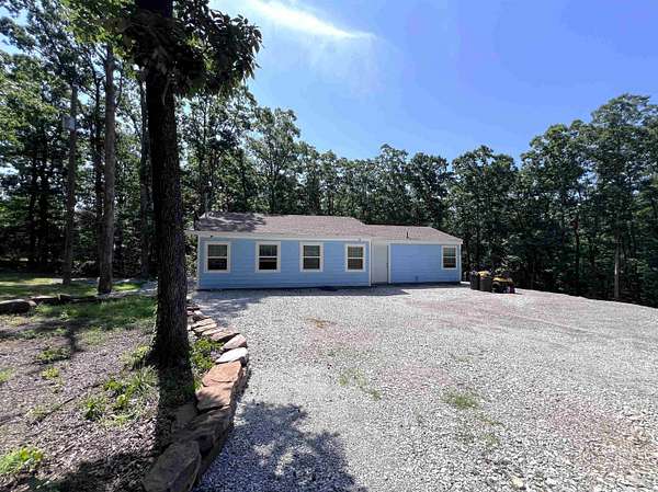 5.24 Acres of Land with Home for Sale in Mountain View, Arkansas