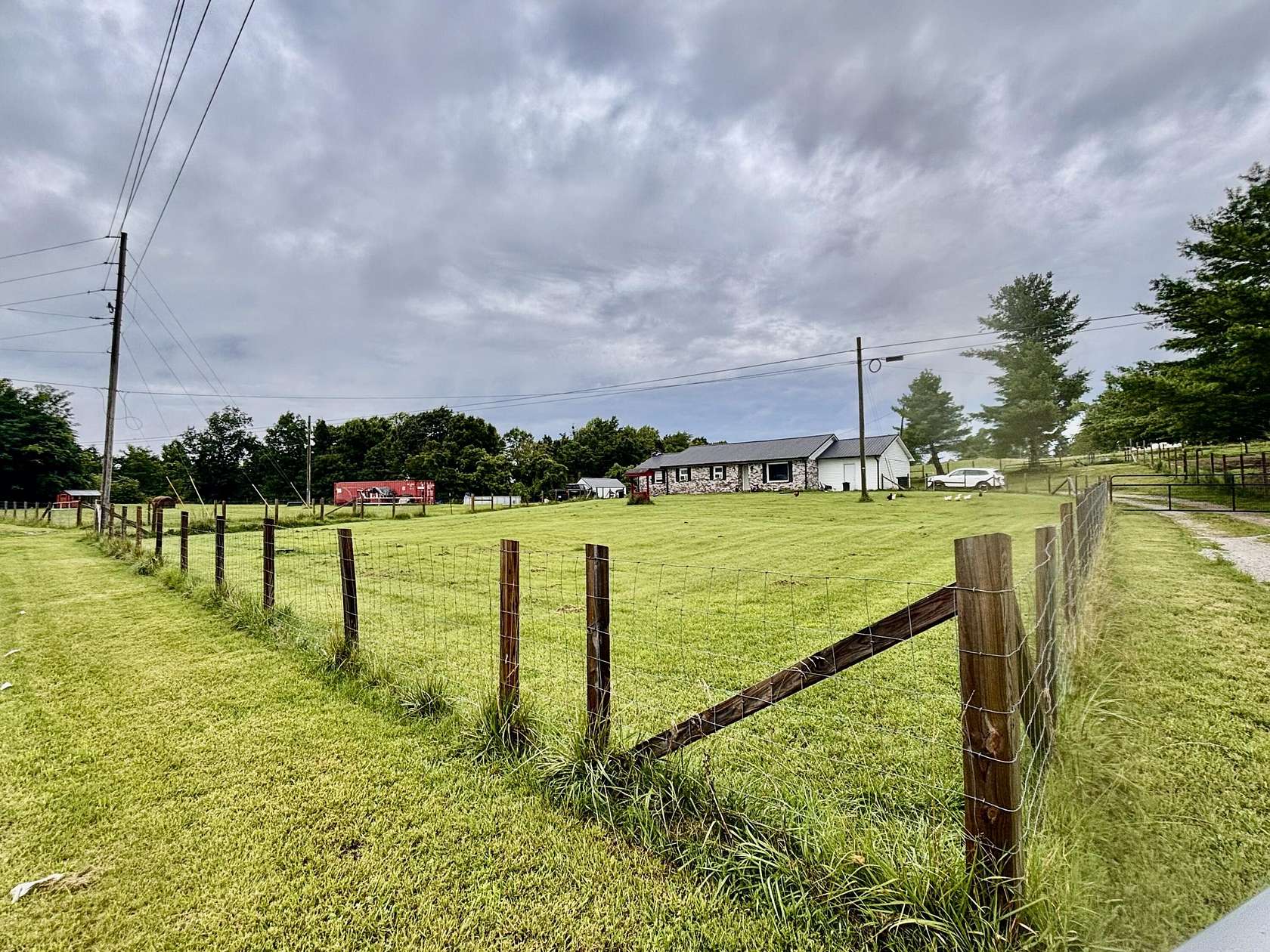 56.3 Acres of Agricultural Land with Home for Sale in McKee, Kentucky