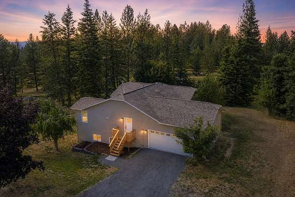 9.72 Acres of Land with Home for Sale in Chattaroy, Washington