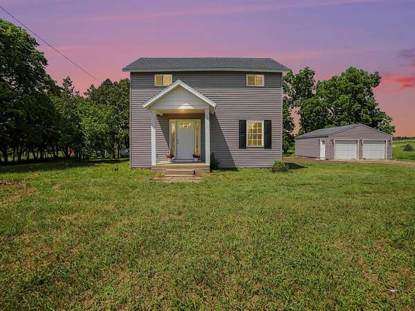 2.32 Acres of Land with Home for Sale in Scottville, Michigan