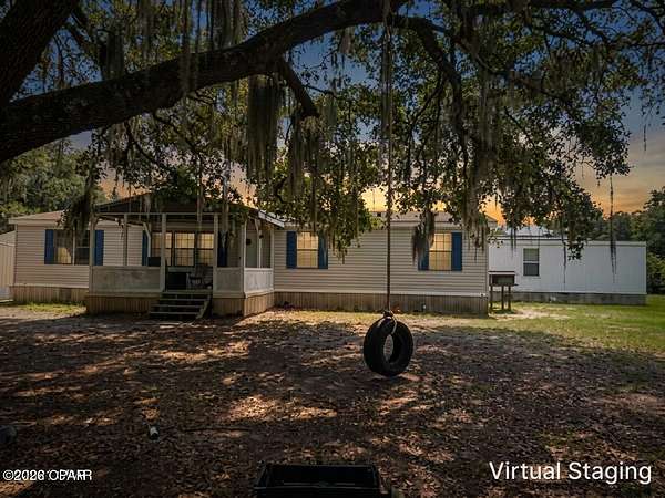 10 Acres of Recreational Land with Home for Sale in Fountain, Florida