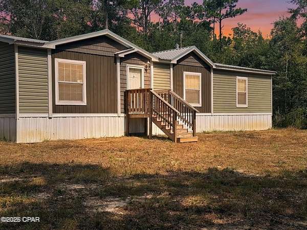 1.7 Acres of Land with Home for Sale in Grand Ridge, Florida