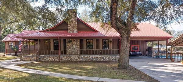 6.69 Acres of Land with Home for Sale in Bonifay, Florida