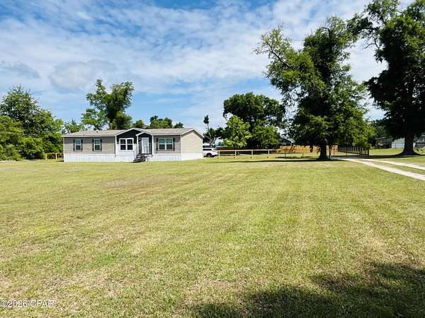 2 Acres of Land with Home for Sale in Marianna, Florida