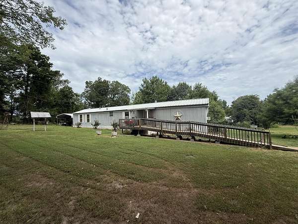 5 Acres of Land with Home for Sale in Gilmer, Texas