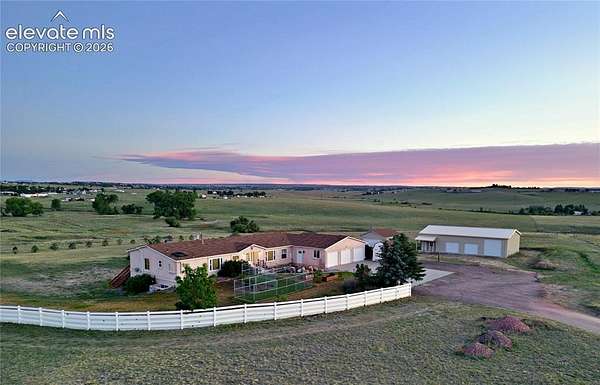 35 Acres of Agricultural Land with Home for Sale in Peyton, Colorado